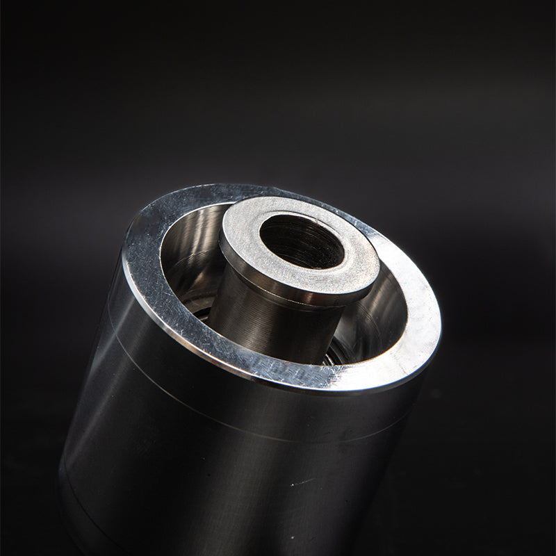 Suspension Secrets solid rear control arm bush, close-up of the inner sleeve on a dark background
