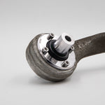 Suspension Secrets solid front control arm bush fitted in a factory front control arm - Suspension Secrets Thumbnail