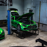 Mercedes-AMG GT R raised on a workshop hoist for alignment - Suspension Secrets Thumbnail