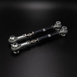 Pair of Suspension Secrets rear upper third link arms on a black background - Suspension Secrets Thumbnail