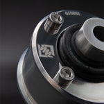 Suspension Secrets front bush, close-up of the retaining bolts, logo and inner joint - Suspension Secrets Thumbnail