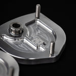 Suspension Secrets front top mount, detail of the offset bearing and camber slot - Suspension Secrets Thumbnail