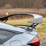 PRL wing riser lifting the FL5 factory wing - side close-up - PRL Motorsports Thumbnail