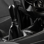 COBB tall weighted shift knob – black knob with black ring fitted in car (product illustration) - Cobb Tuning Thumbnail