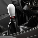 COBB tall weighted shift knob – white knob with red ring fitted in car (product illustration) - Cobb Tuning Thumbnail