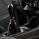 COBB tall weighted shift knob – black knob with red ring fitted in car (product illustration) - Cobb Tuning Thumbnail