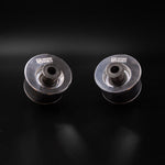 Suspension Secrets front offset caster bushes from the kit, pair on a black background - Suspension Secrets Thumbnail