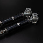 Suspension Secrets rear third link arms, close-up of the rod ends and engraved logos on black - Suspension Secrets Thumbnail