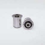 Suspension Secrets lower control arm inner monoballs, pair on white, side and end views - Suspension Secrets Thumbnail