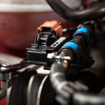 COBB VW and Audi flex fuel kit – installed sensor and blue quick-connect fittings close-up - Cobb Tuning Thumbnail