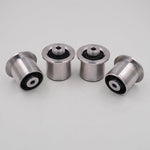 Suspension Secrets wishbone monoballs, four bushes showing the bearing faces - Suspension Secrets Thumbnail