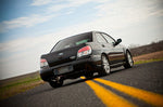COBB cat-back exhaust – Subaru Impreza WRX GD – fitted to a black sedan, rear view - Cobb Tuning Thumbnail