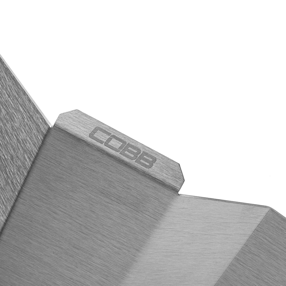 COBB ABS module heat shield – Volkswagen Golf GTI / Golf R – laser-etched COBB logo close-up