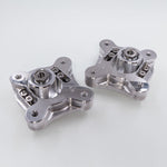 Suspension Secrets camber and caster plates, top view of the pair showing the centre nuts and adjuster bolts - Suspension Secrets Thumbnail