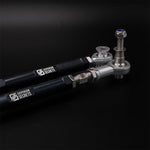 Suspension Secrets rear toe arms, close-up of the logo and outer rod ends - Suspension Secrets Thumbnail