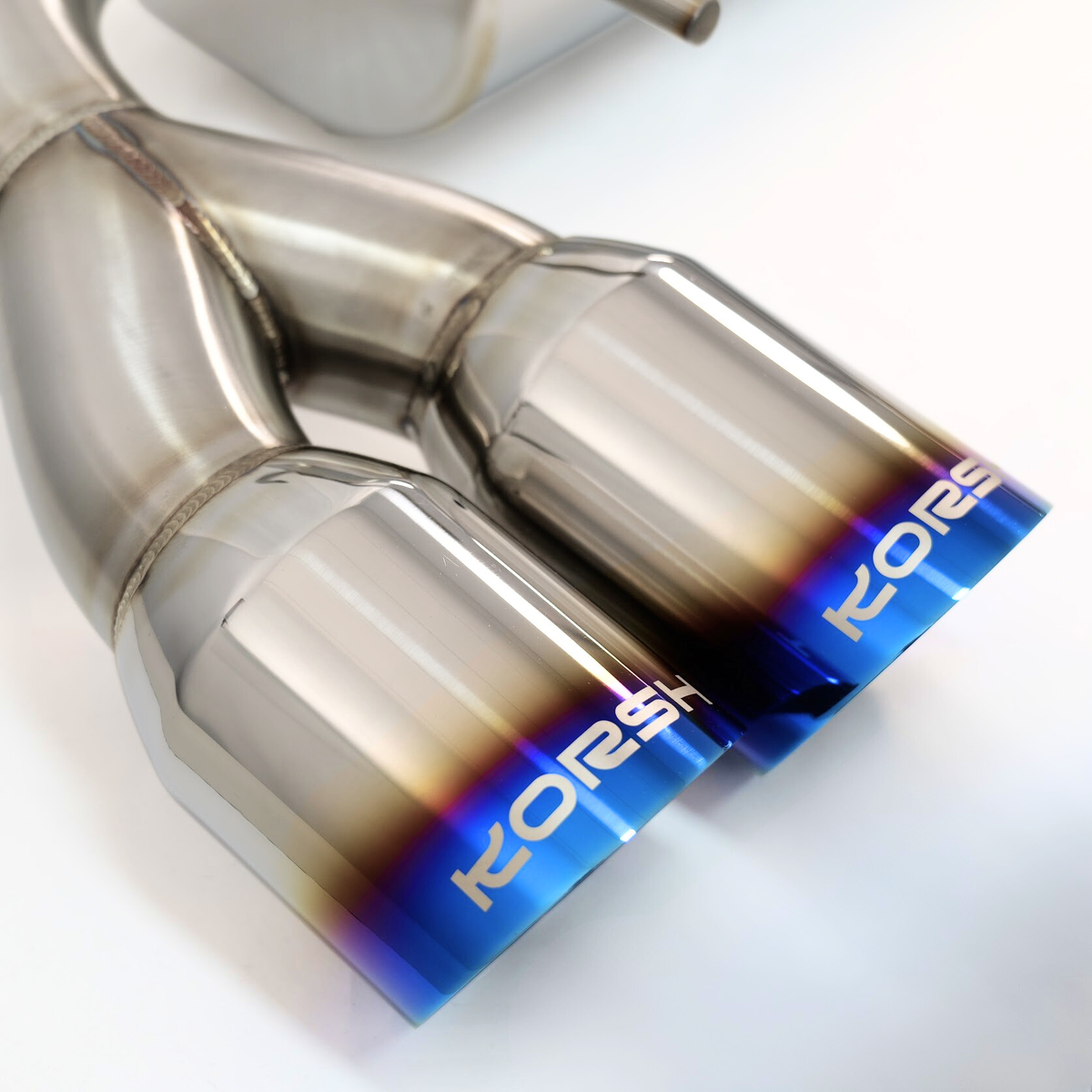 KORSH burnt titanium exhaust tips with etched logo – close-up