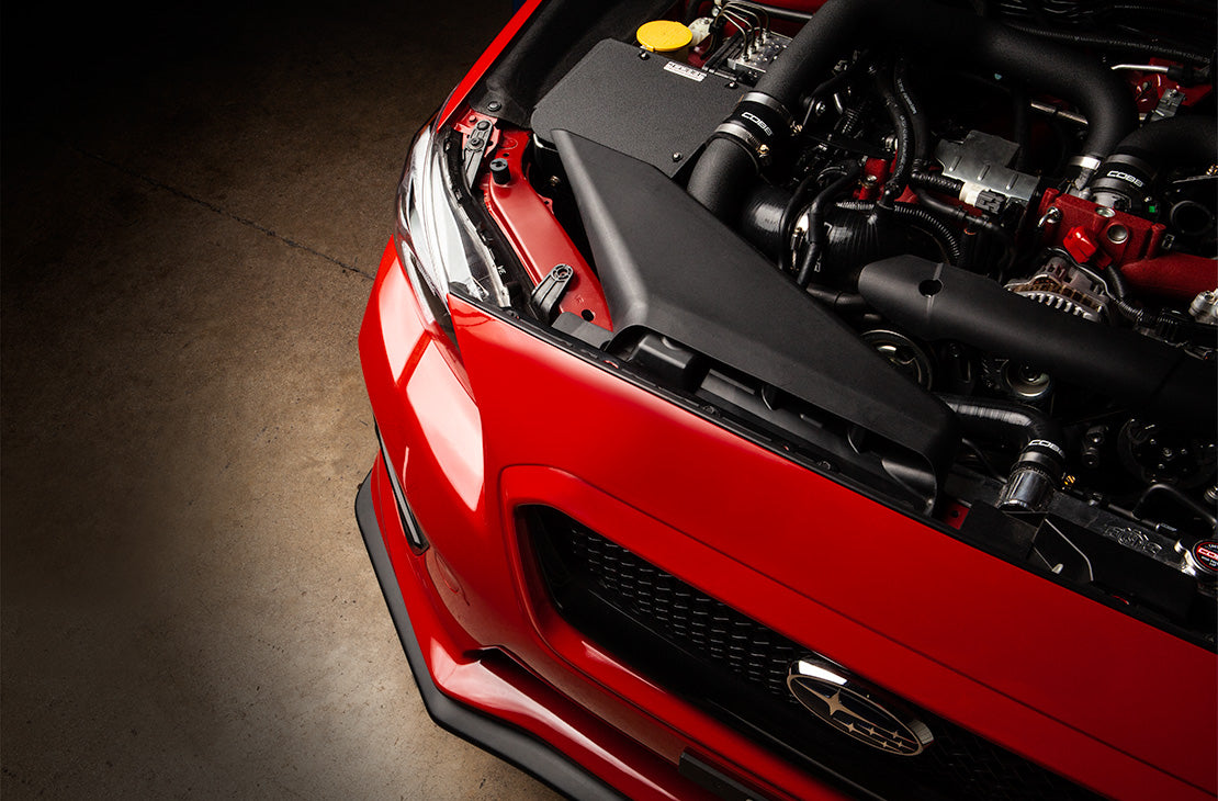 COBB SF airbox – Subaru WRX STI VA – installed in a red STI engine bay