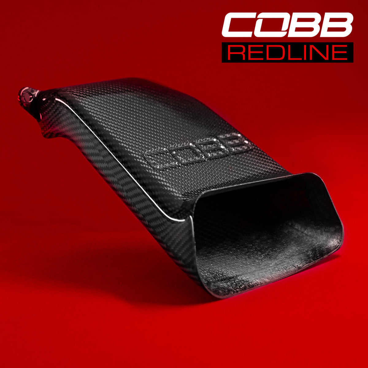 COBB Redline carbon fibre air scoop – Ford Focus ST – scoop on red Redline backdrop