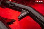 COBB Redline carbon Big SF intake – Nissan GT-R R35 – carbon tube and badge in red light - Cobb Tuning Thumbnail