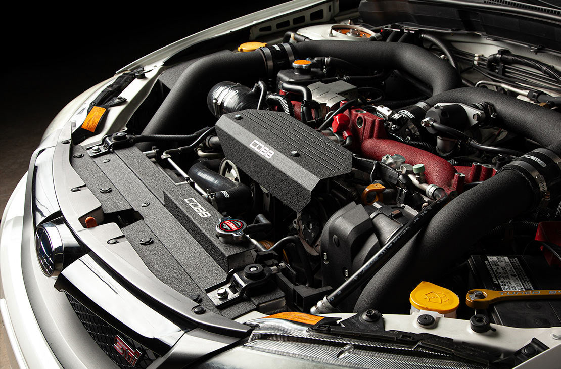 COBB radiator shroud – Subaru Impreza WRX STI – installed in a white car's engine bay