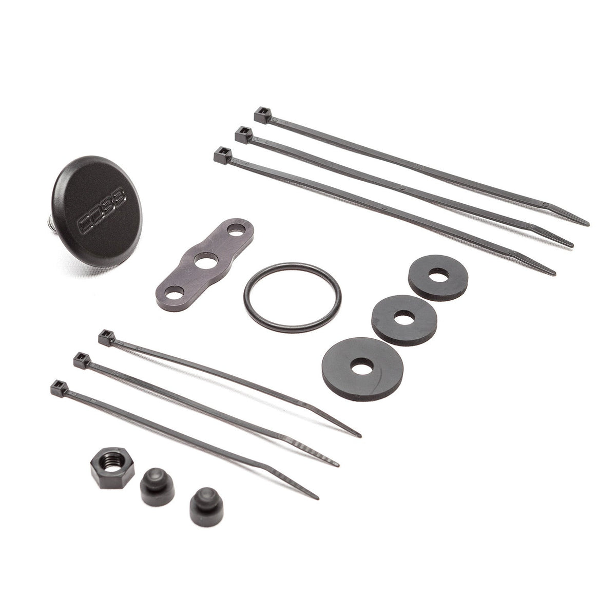COBB rear wiper delete – cap, backing plate, seals, nut and cable ties laid out