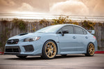 COBB Titan7 T-S5 wheel – Subaru WRX STI VA – Cyber Gold wheels on a grey STI, side view - Cobb Tuning Thumbnail