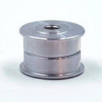 Suspension Secrets solid bush inserts, two halves stacked as they sit in the arm - Suspension Secrets Thumbnail