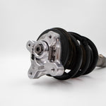 Suspension Secrets camber and caster plate fitted to the top of a strut and spring assembly - Suspension Secrets Thumbnail