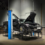 Black Ferrari F430 Spider on a workshop hoist for alignment - Suspension Secrets Thumbnail