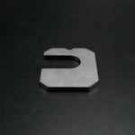 Suspension Secrets camber shim, single shim flat on a dark surface - Suspension Secrets Thumbnail