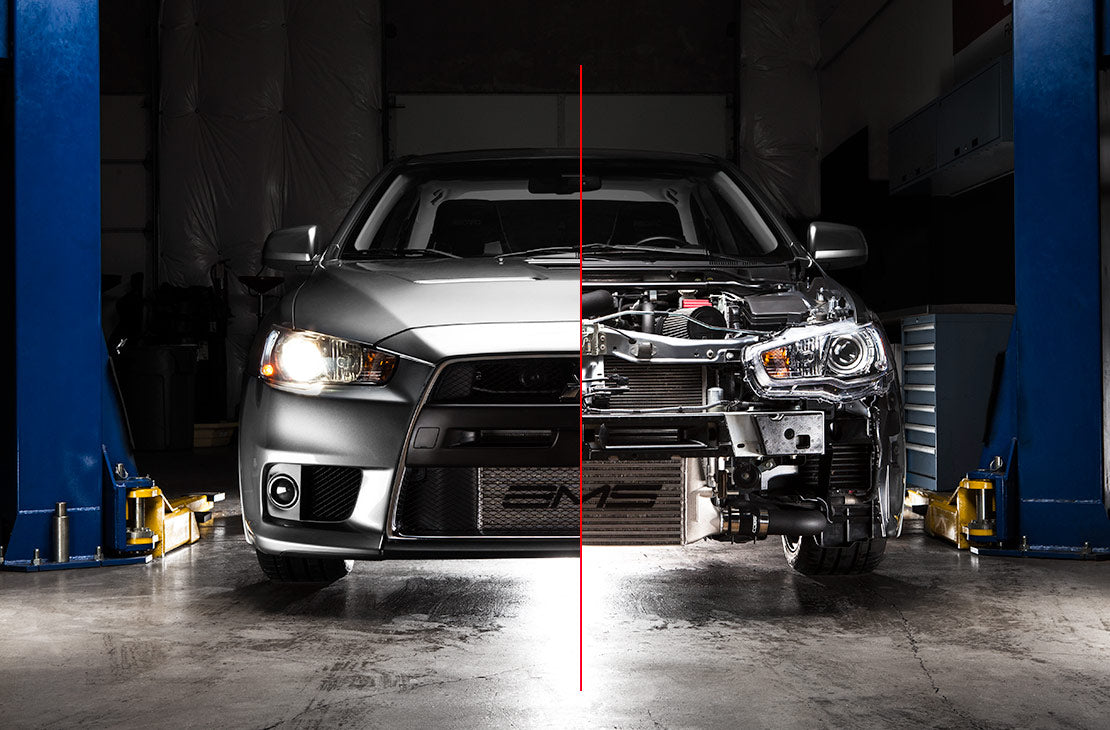 AMS front mount intercooler – Mitsubishi Lancer Evolution X – split view of the car showing the core fitted, bumper off