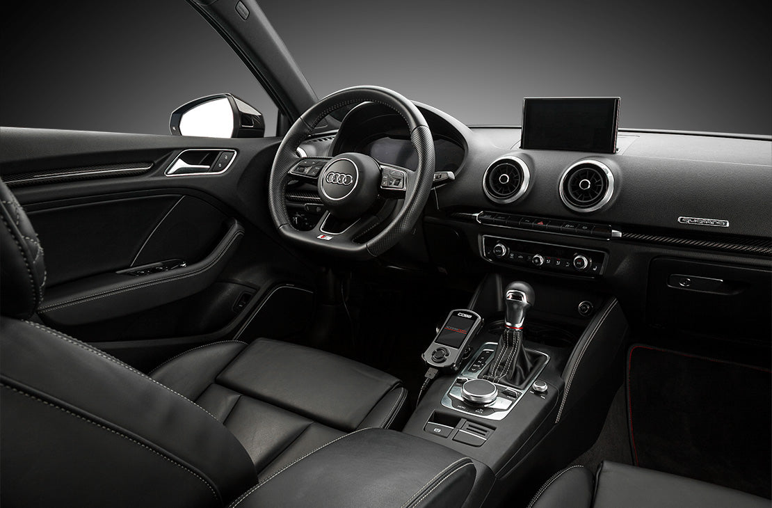 COBB Accessport V3 mounted beside the gear selector in an Audi A3/S3 8V cabin