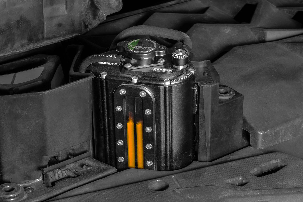 Radium billet coolant tank installed in the OEM location on a Can-Am