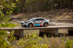 COBB lowering springs – Subaru WRX VB – lowered WRX on a bridge among trees - Cobb Tuning Thumbnail