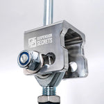 Suspension Secrets rear toe arm billet bracket, front view with engraved logo - Suspension Secrets Thumbnail