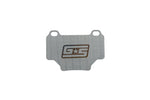 GrimmSpeed titanium rear brake shim for the WRX STI (VA) - front face with GS logo - GrimmSpeed Thumbnail