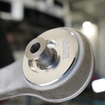 Suspension Secrets offset caster bush pressed into a front control arm - Suspension Secrets Thumbnail