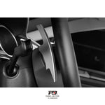 LEYO Sportline paddle shift extension – silver paddle fitted, side view behind wheel - LEYO Thumbnail