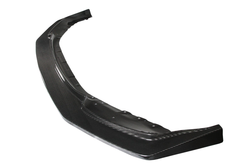 APR carbon fibre front air dam lip for the BMW M2 G87, three-quarter view on white - APR Performance