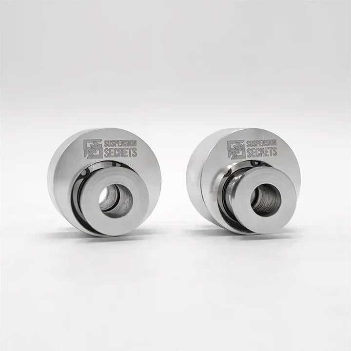 Suspension Secrets eccentric rear control arm bushes, pair on a white background - Suspension Secrets