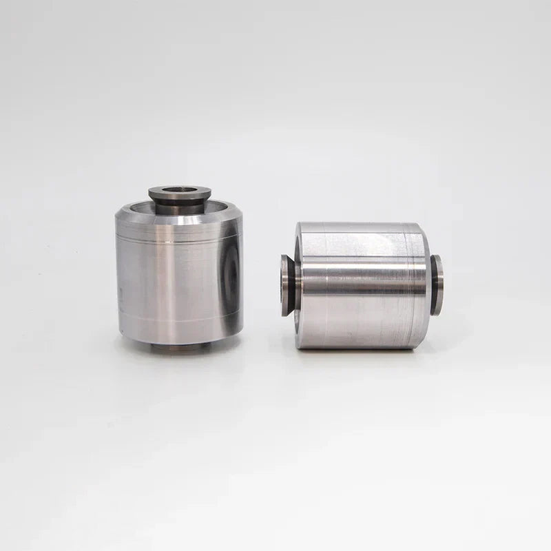Suspension Secrets solid rear control arm bushes, pair on a white background - Suspension Secrets