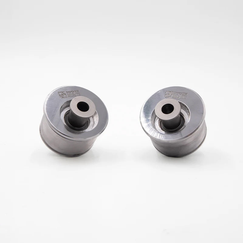 Suspension Secrets front offset camber bushes, pair on a white background - Suspension Secrets