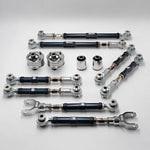 Suspension Secrets full kinematics kit, adjustable arms and solid bushes laid out on a white background - Suspension Secrets Thumbnail