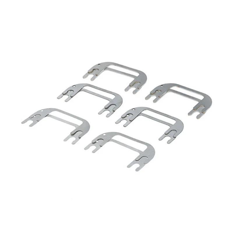 Suspension Secrets camber shim kit, six forked stainless shims on white - Suspension Secrets