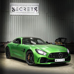 Green Mercedes-AMG GT R parked in front of the Suspension Secrets sign - Suspension Secrets Thumbnail
