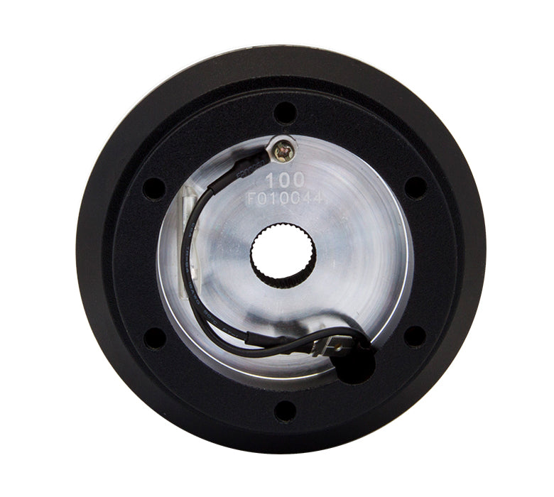 NRG SRK-100H short hub – wheel-side face with 6x70mm bolt holes and horn contact