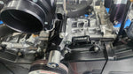 Torque Solution tensioner bracket fitted to a Subaru EJ engine beside the throttle body - Torque Solution Thumbnail
