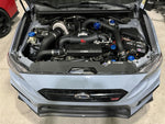 Torque Solution intake manifold fitted in a Subaru WRX STI (VA) engine bay, front view - Torque Solution Thumbnail