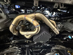 Torque Solution EJ equal length header fitted under a Subaru EJ engine - Torque Solution Thumbnail