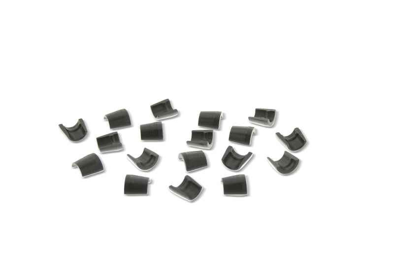 Ferrea steel valve locks for 6mm Subaru valve stems, set laid out (product illustration)